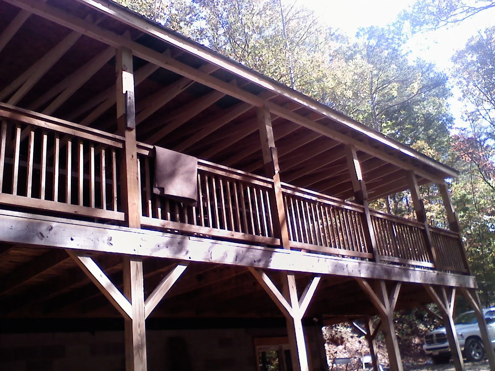Timber framing under a new elevated porch and deck — Roof Leak Repair in Silvis by Roofing Brothers
